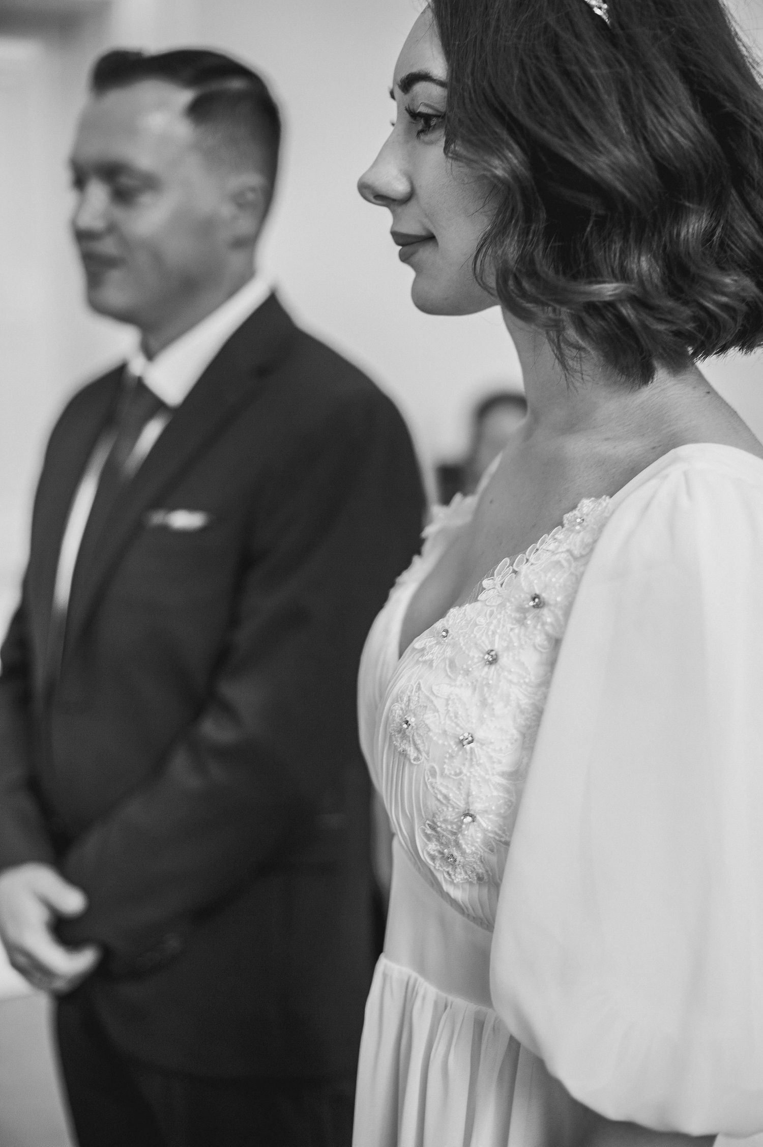 Documentary-style image of guests celebrating at the wedding reception