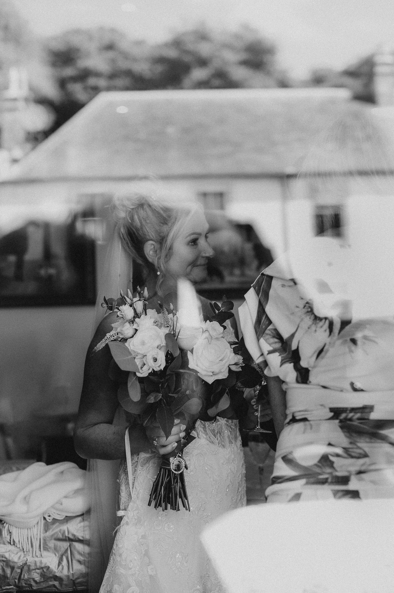 Groom adjusting his tie before the ceremony