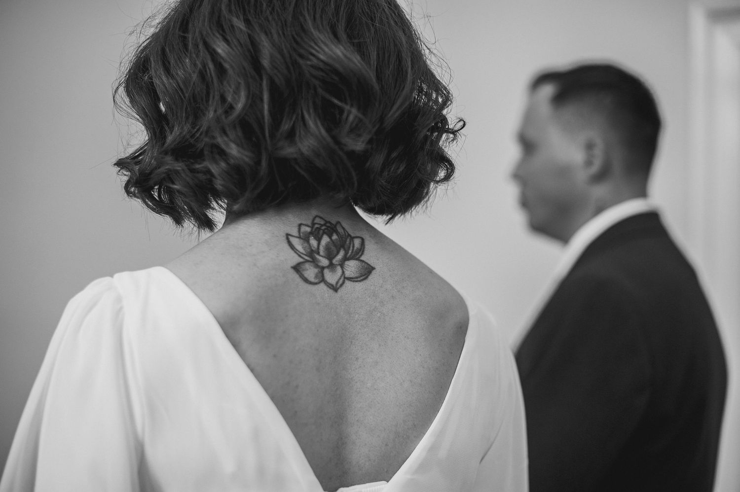Documentary-style image of guests celebrating at the wedding reception