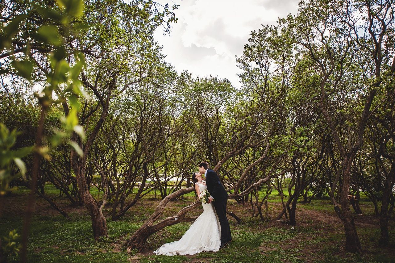 Candid photo of the couple laughing at their outdoor ceremony
