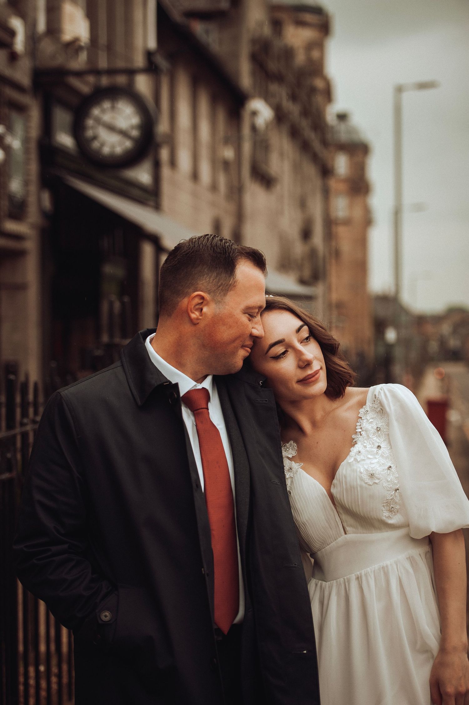 Candid photo of the couple laughing at their outdoor ceremony
