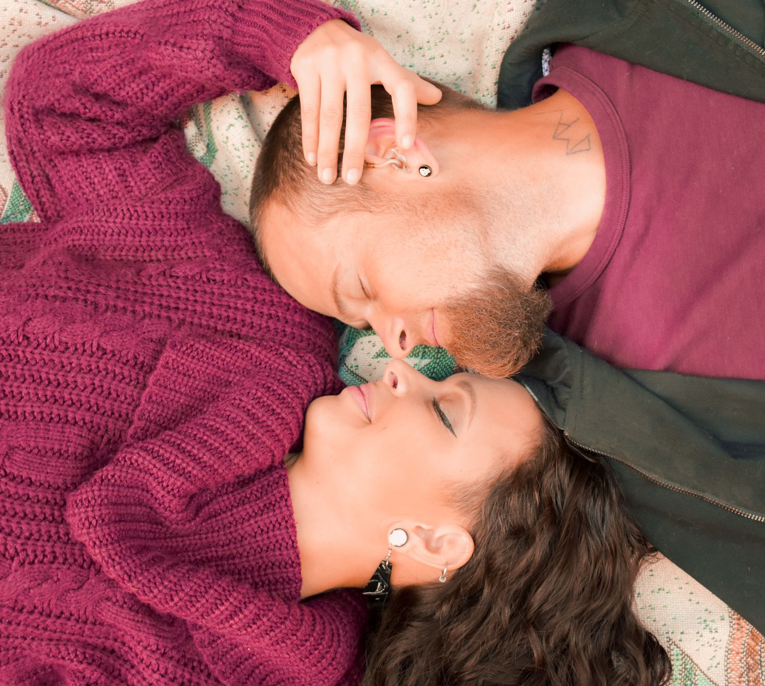 A sequence of images showing someone in a burgundy sweater lying down with their eyes closed.
