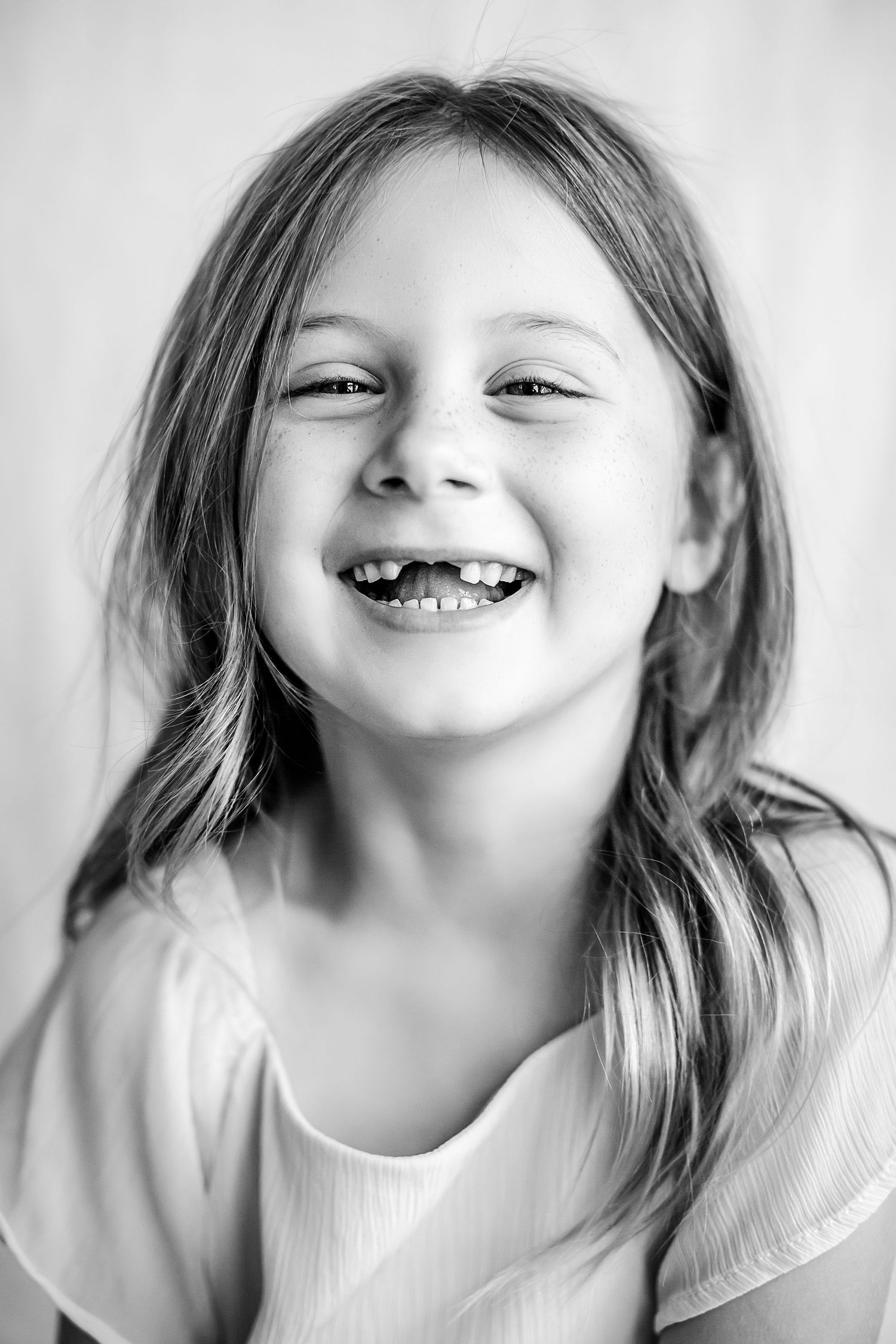 Black and white Child Mini Session Petite Personality Portrait in Sarasota, Florida.