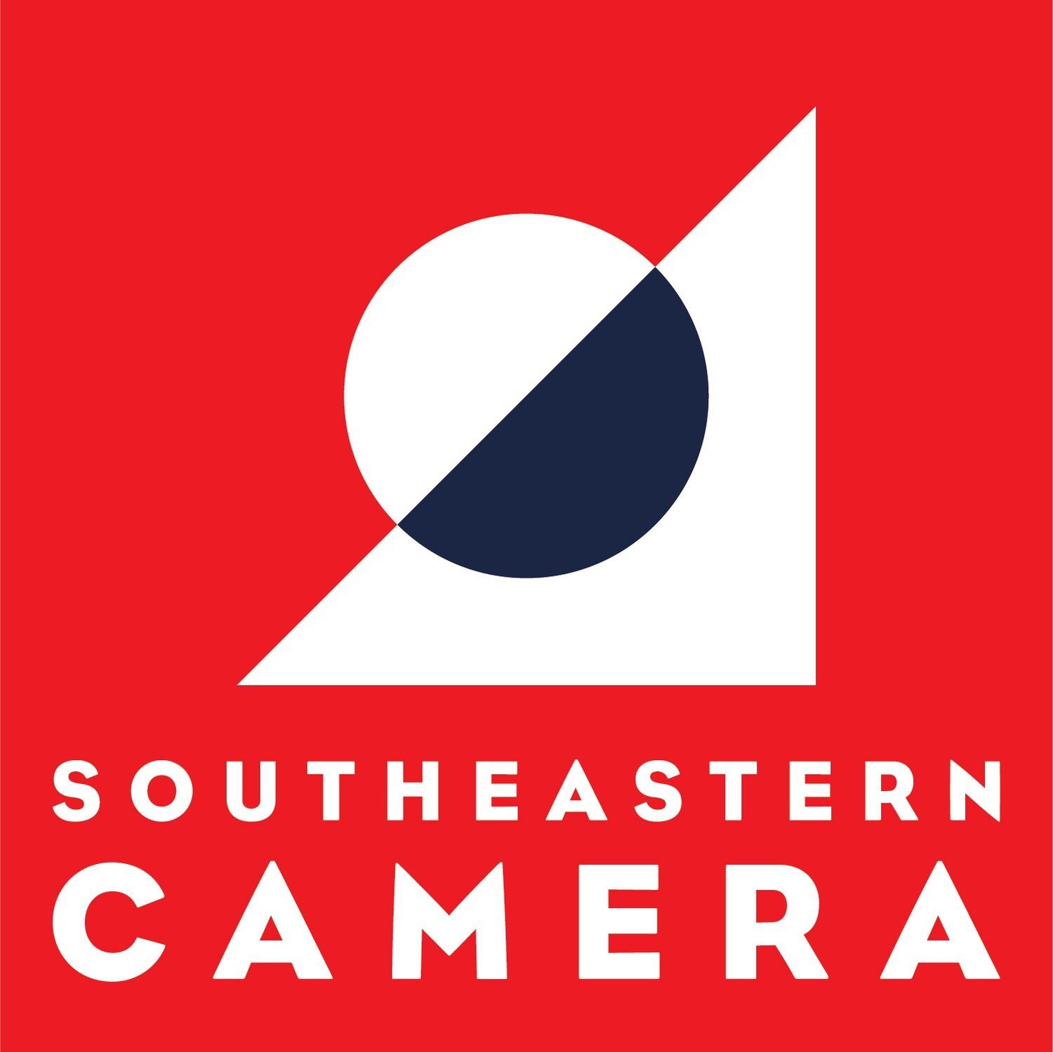 A red and navy blue geometric logo design for Southeastern Camera with minimalist shapes.