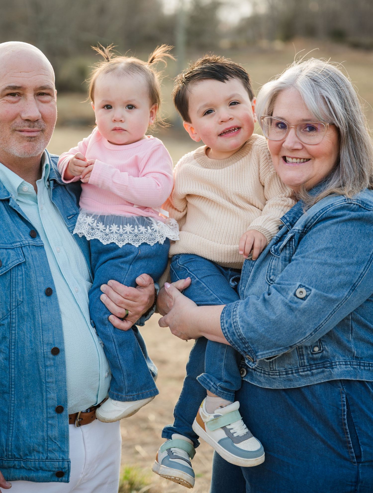 A series of candid outdoor family photos showing casual interactions in denim and neutral clothing on a sunny day.