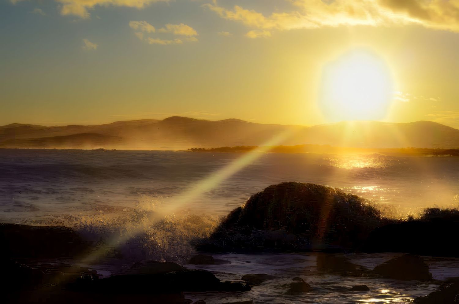 Golden sunrise over coastal rocks with waves crashing and dramatic sky.