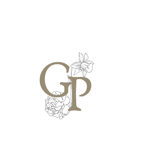 Elegant wedding logo design with floral accents and monogram letters in gold tones.
