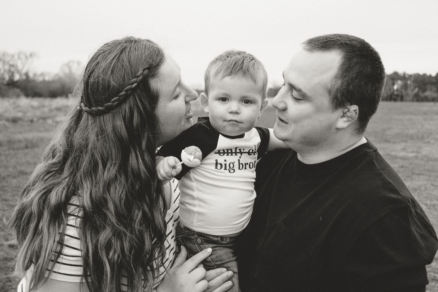 Black and white family lifestyle portraits showing tender moments of connection and joy.
