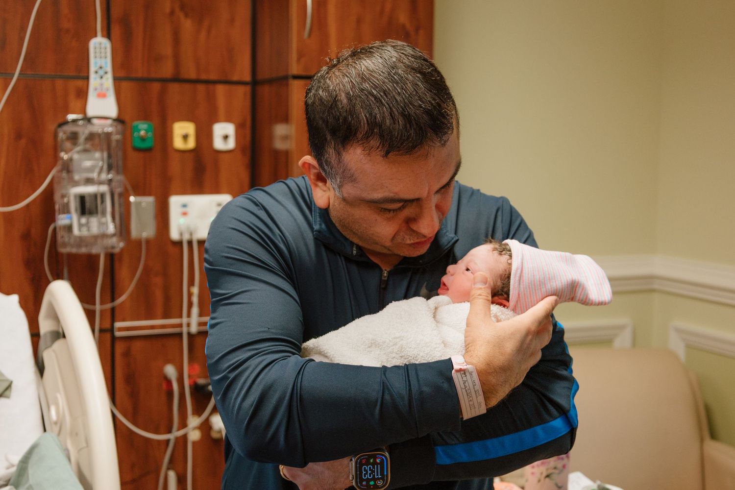 A series of photos showing a newborn baby being examined and cared for in a medical setting.