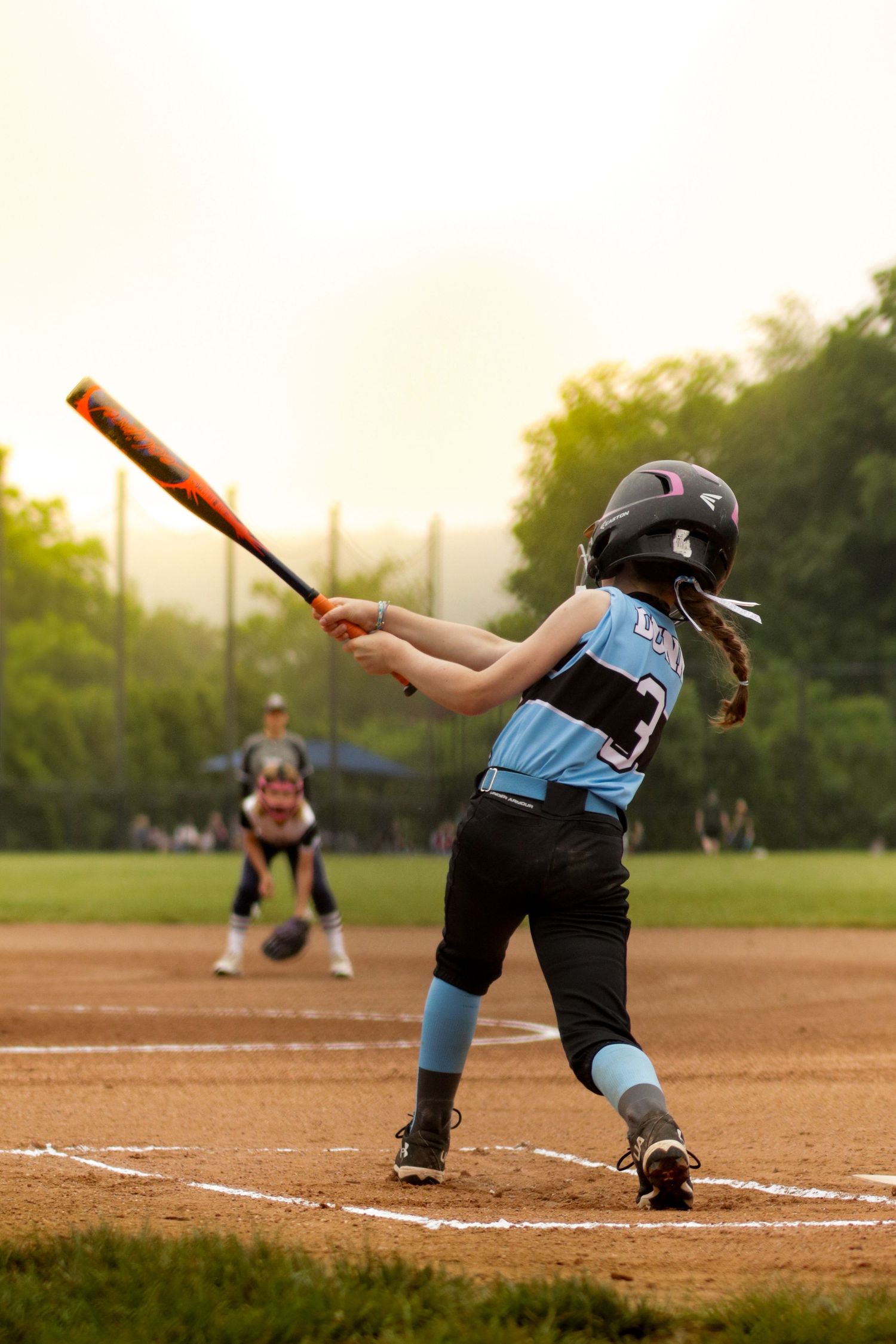 Softball, sports photography, college softball, behind home plate, Central MA.