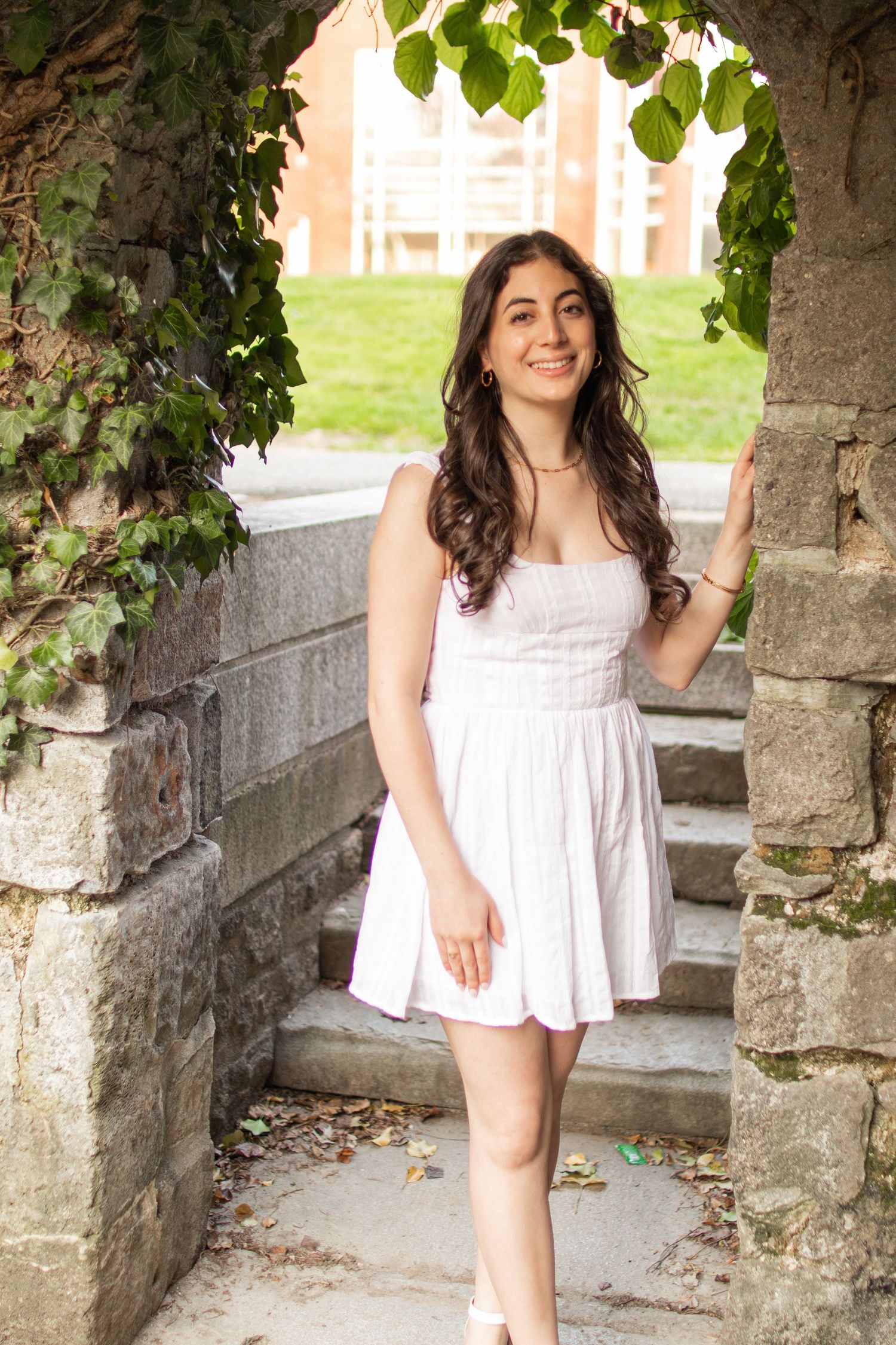 College senior photo, graduation photo, natural light photography, WPI. Worcester, MA. Archway, stone garden.