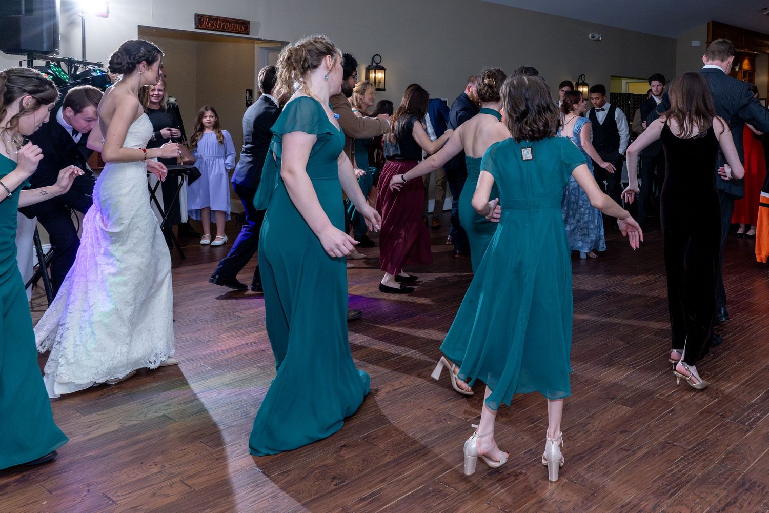 bride and bridesmaids dancing at wedding reception at Stevenson Ridge wedding venue Spotsylvania Virginia
