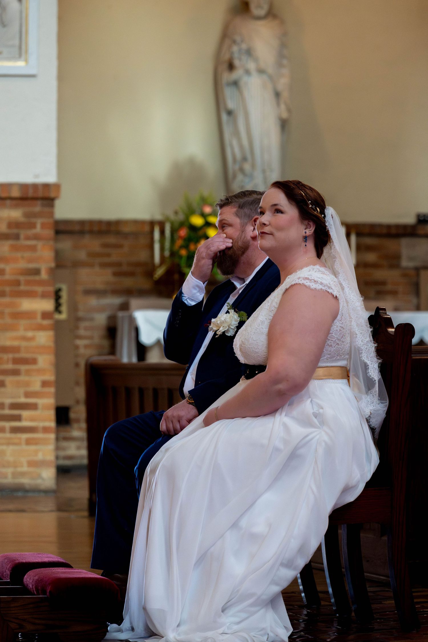 Bride and groom during ceremony at Saint Benedict Catholic Church Richmond Virginia