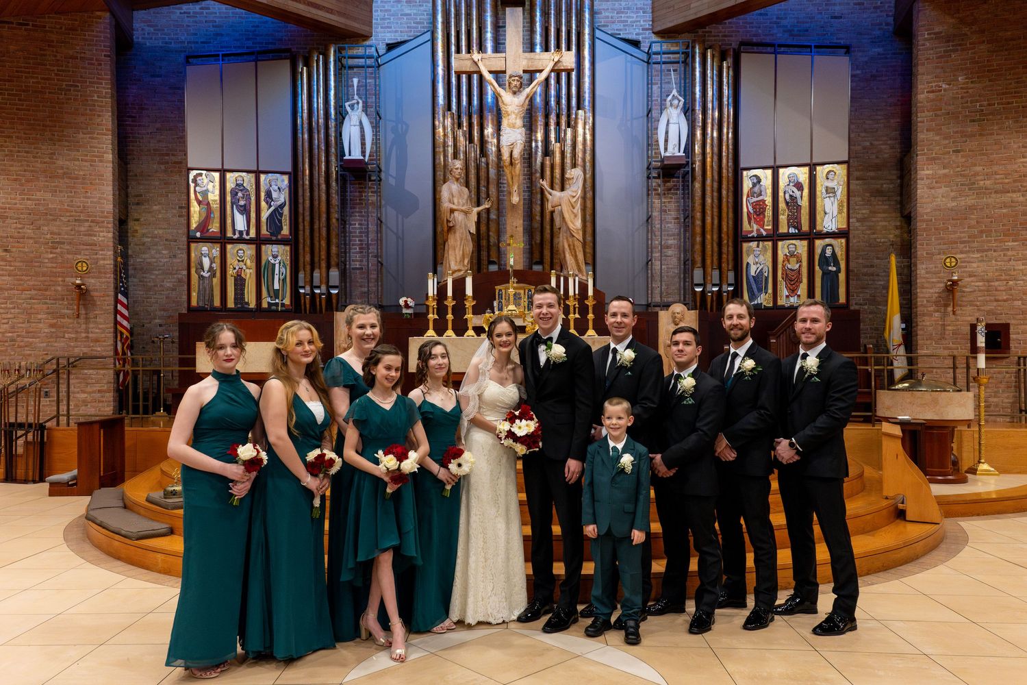Portrait of wedding party in front of Altar at St. Mary of the Immaculate Conception Roman Catholic Church Fredericksburg Virginia