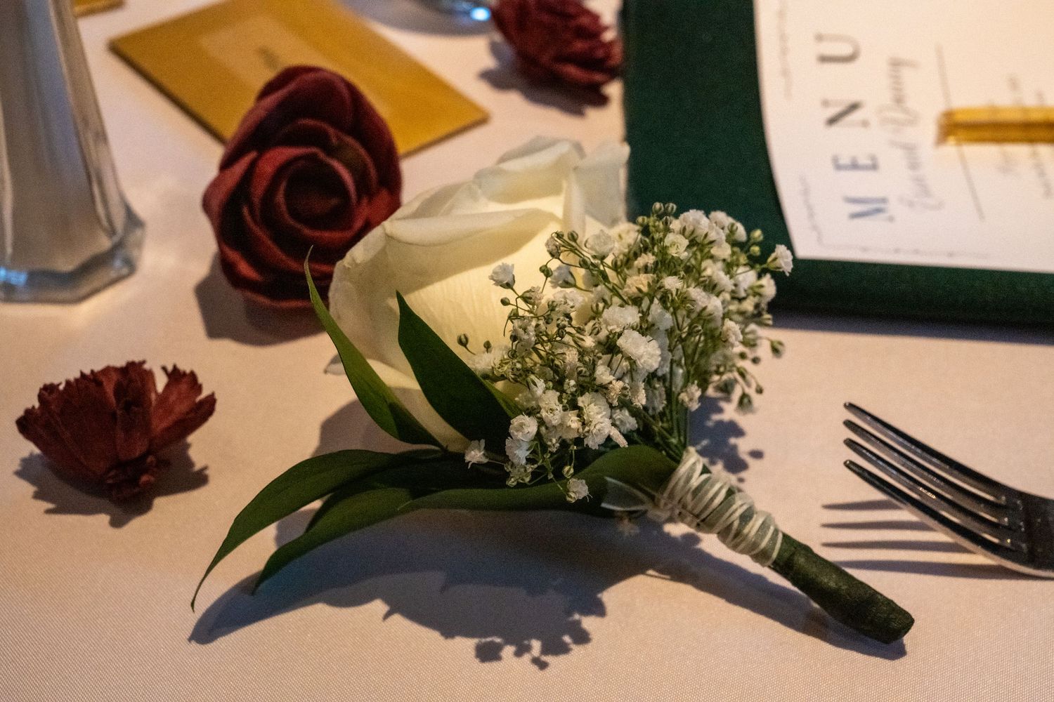 Close up of flower and table setting