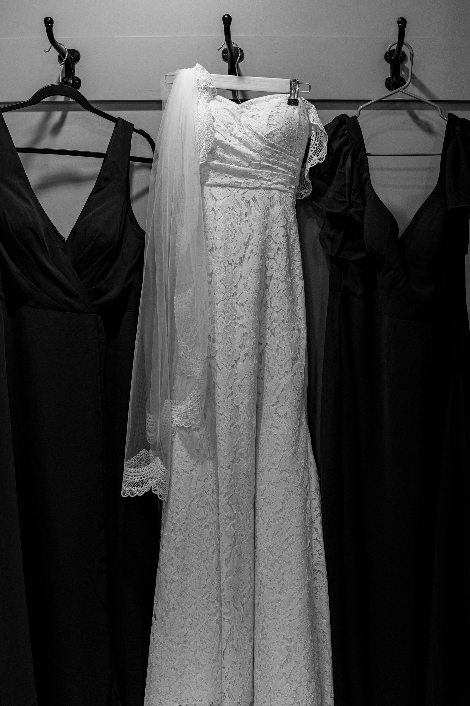 Black and white of wedding dress and bridesmaid dresses