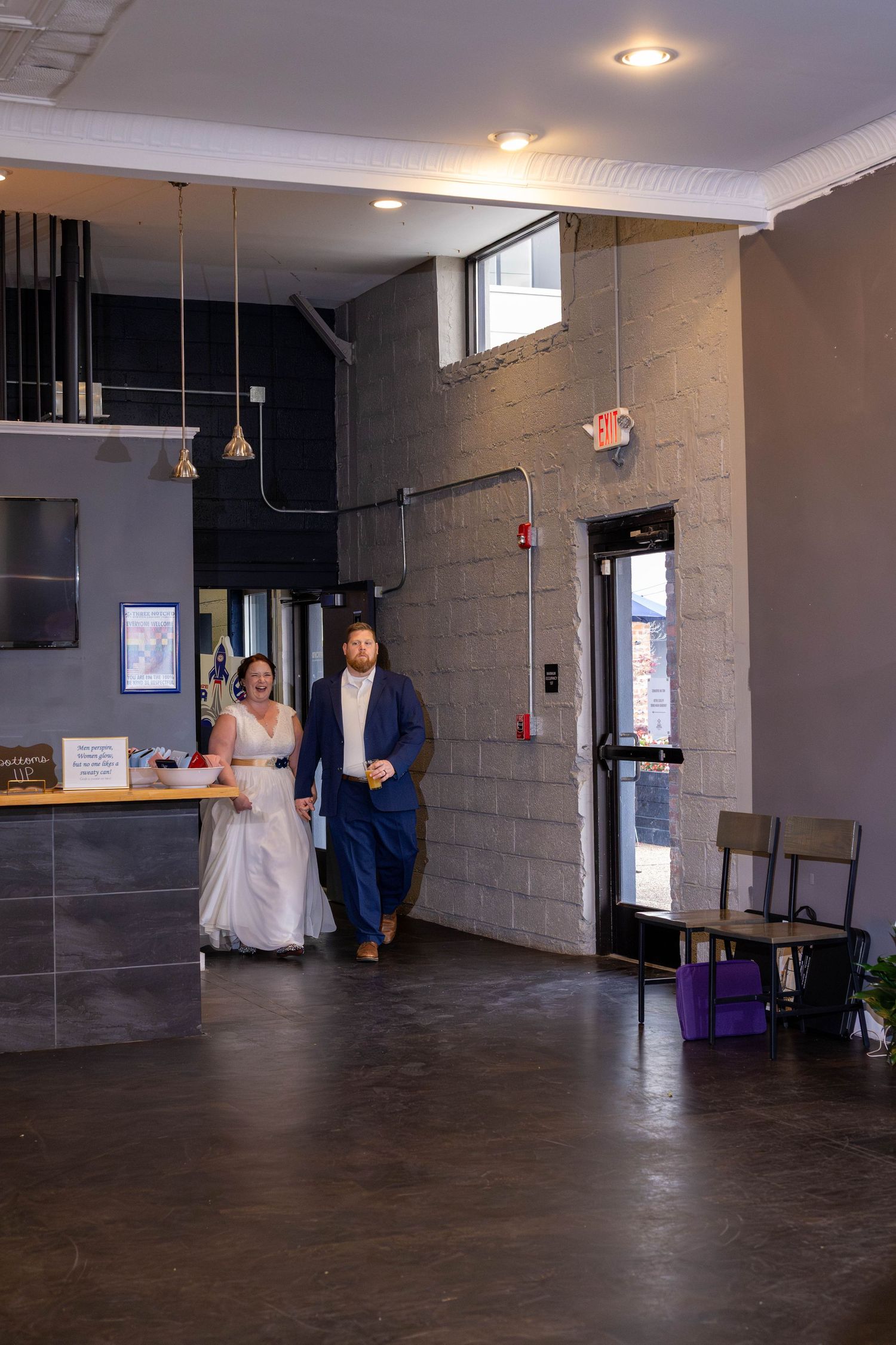 Bride and Groom entering reception at Three Notch'ed Brewery in Richmond Virginia