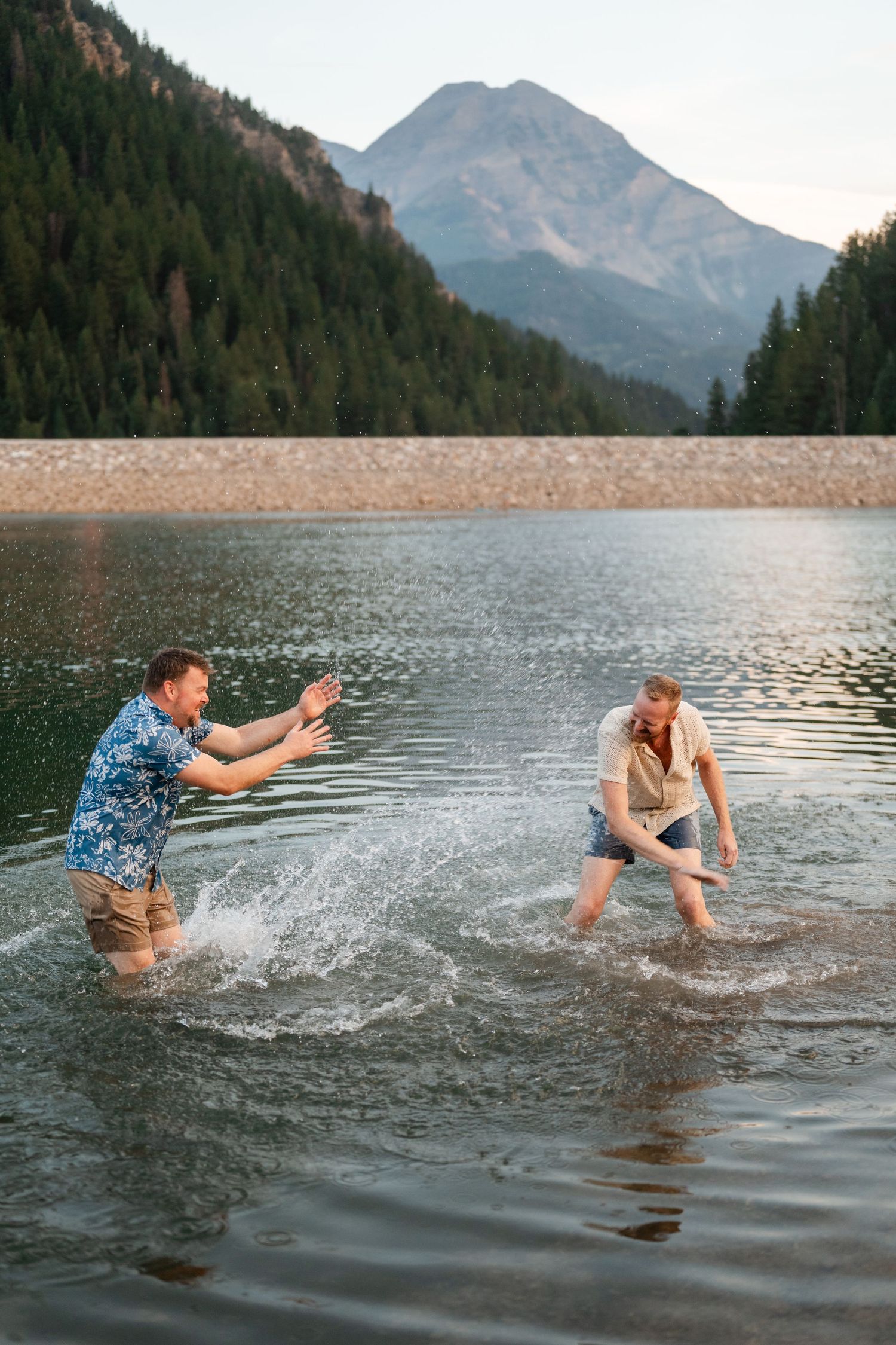 Couple having a water fight at Tibble Fork Reservoir.
