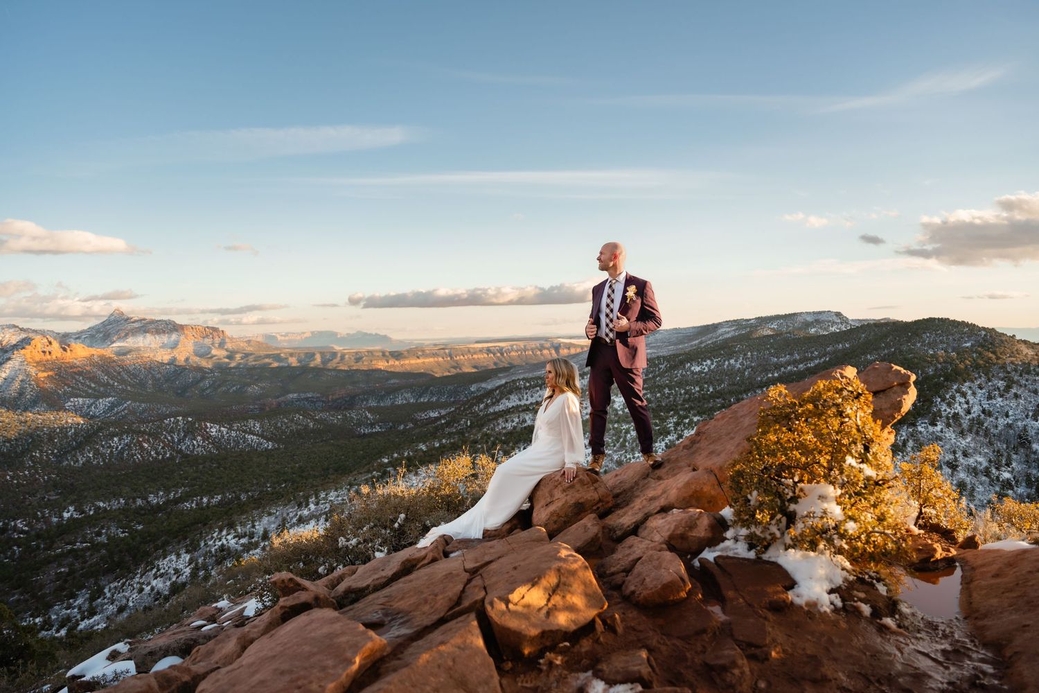 Wedding photos captured against majestic canyon views during golden hour.