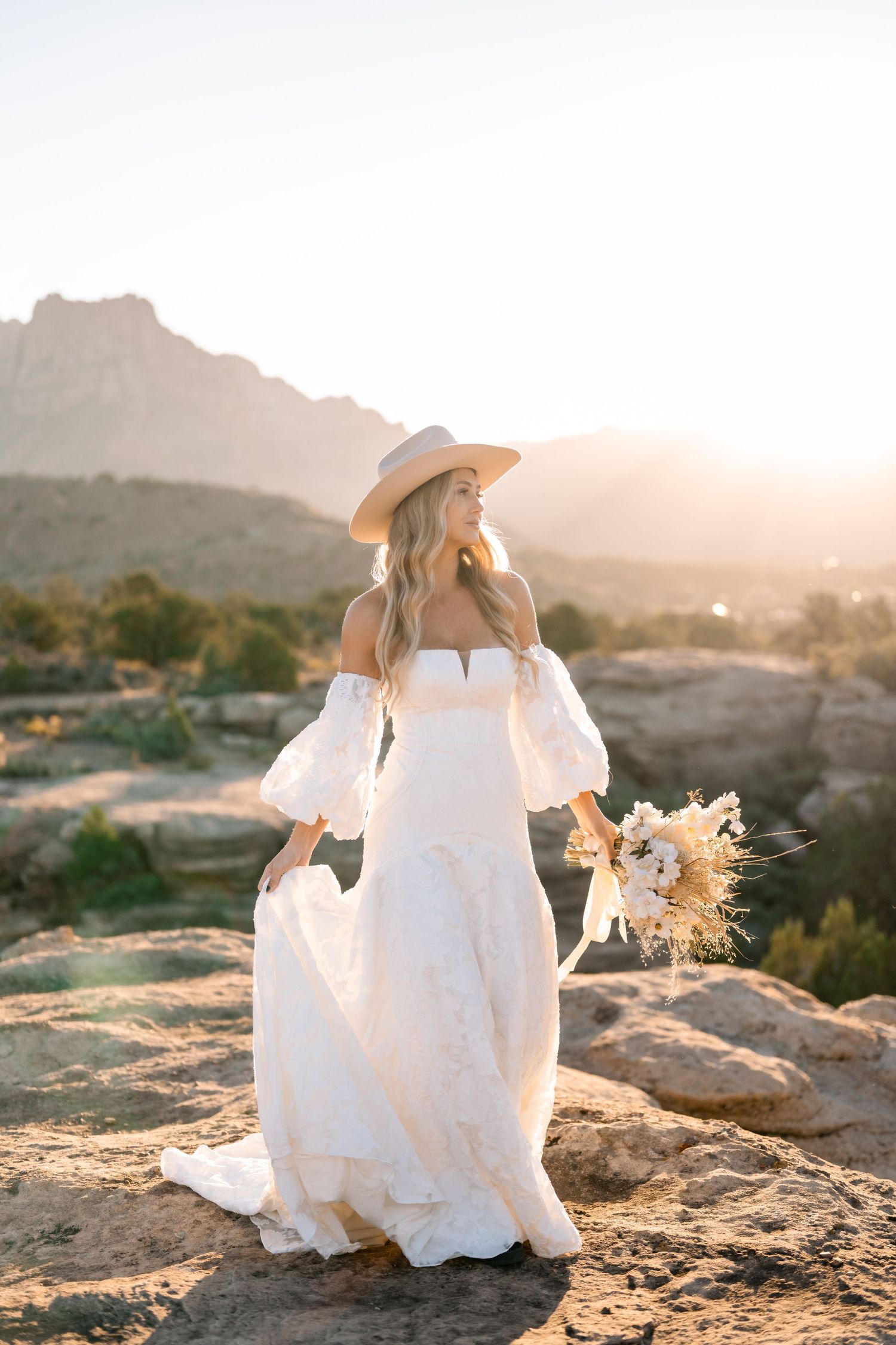 Utah elopement photographer captures the romance of a desert sunrise bridal session
