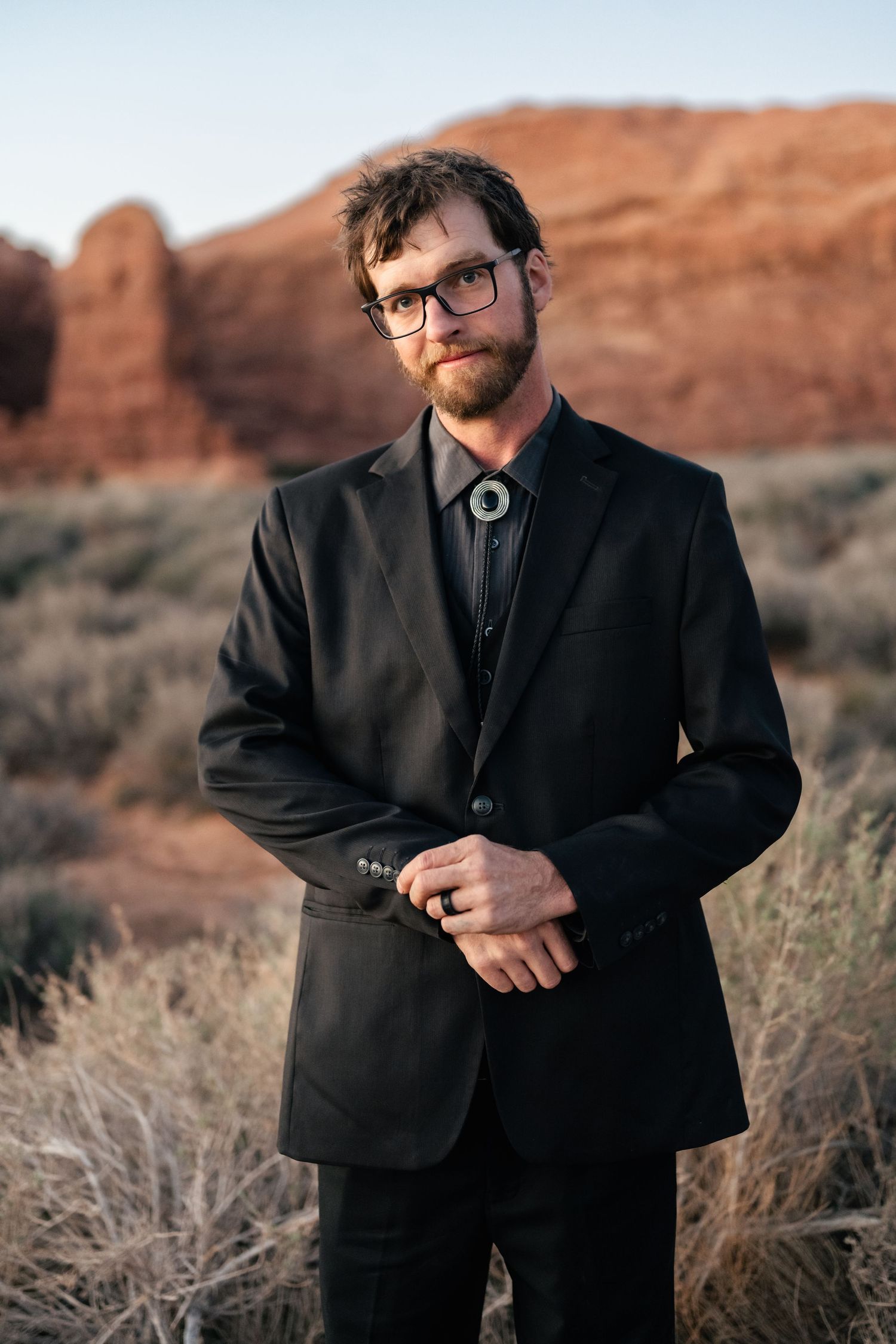 Groom portrait during Arches National Park Elopement by Utah elopement photographer and videographer