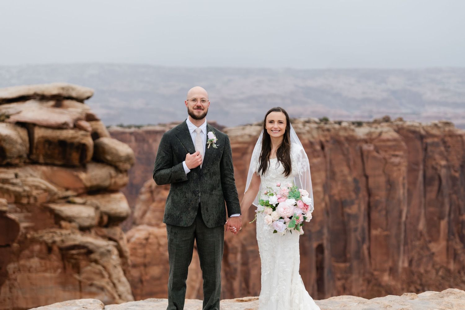 Scenic overlook at Dead Horse Point State Park with dramatic cliffs and desert vistas in the background.