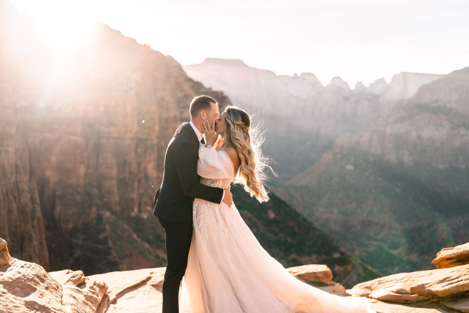 Wedding portraits at the Zion Overlook at sunset by Utah Elopement Photographer