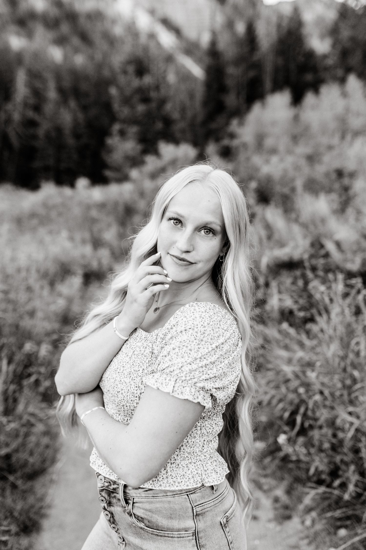 black and white over the shoulder senior portrait