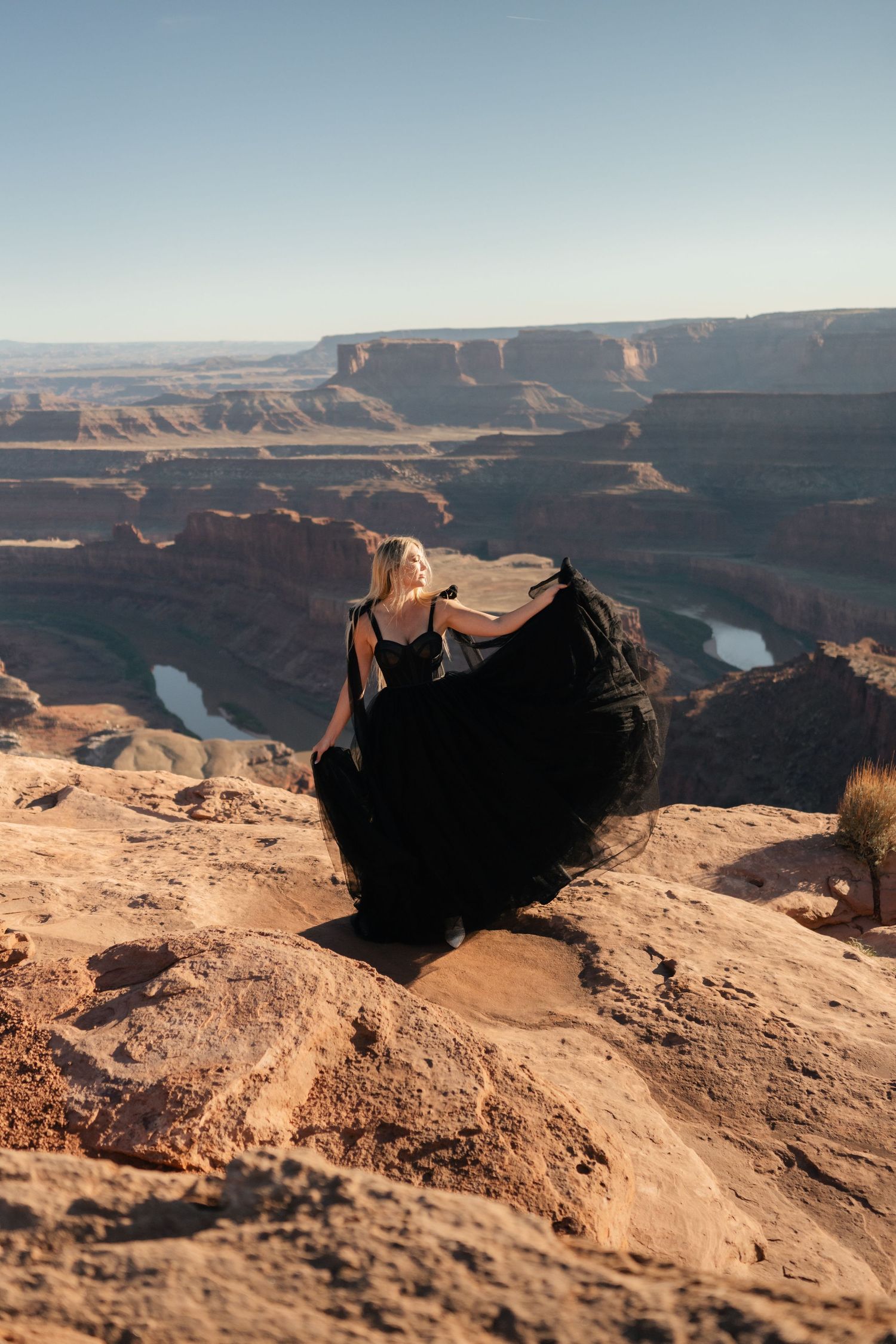 A panoramic series of photos showing the dramatic red rock cliffs and winding river at Dead Horse Point State Park, Utah.