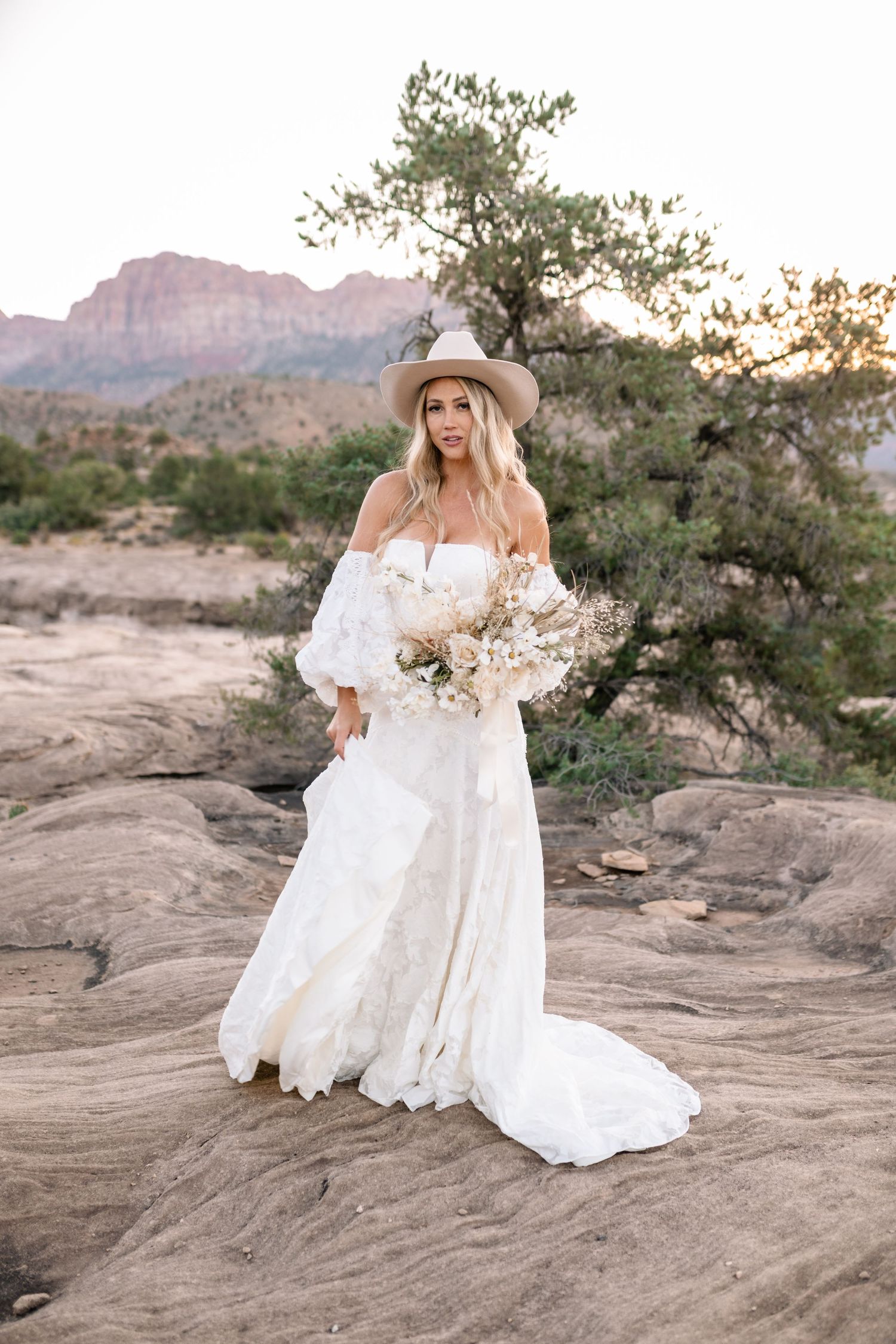 Utah elopement photographer captures the romance of a desert sunrise bridal session
