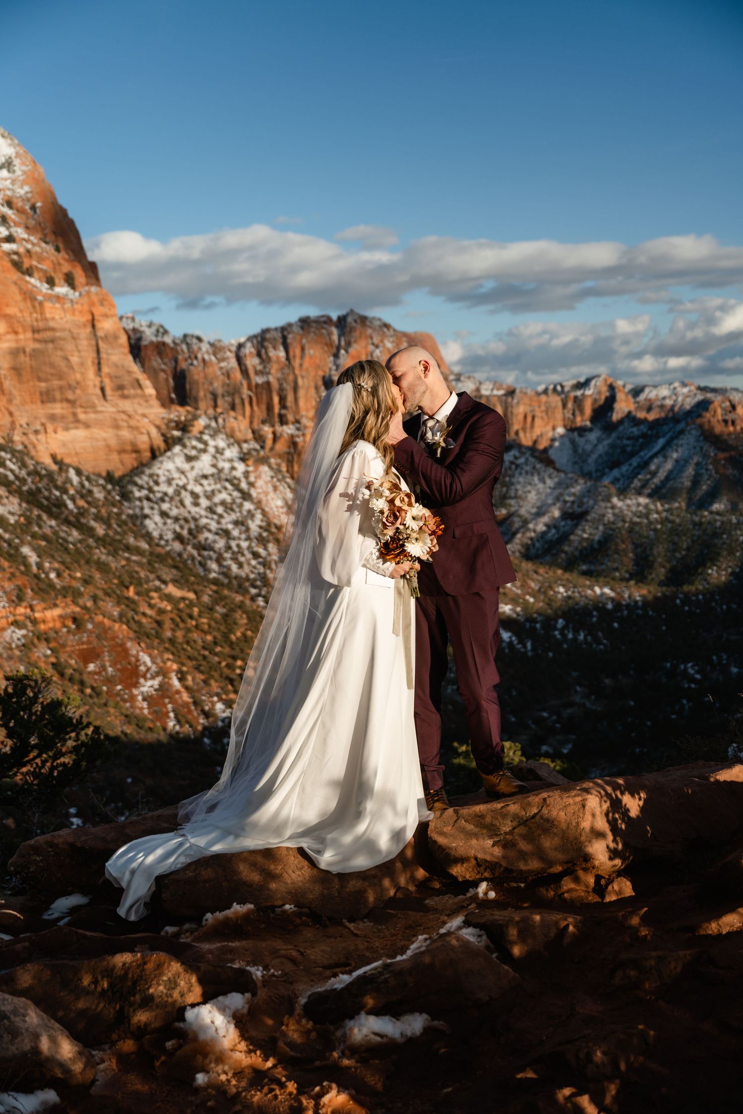 Stunning golden hour view of Zion National Park's towering sandstone cliffs and deep canyons.