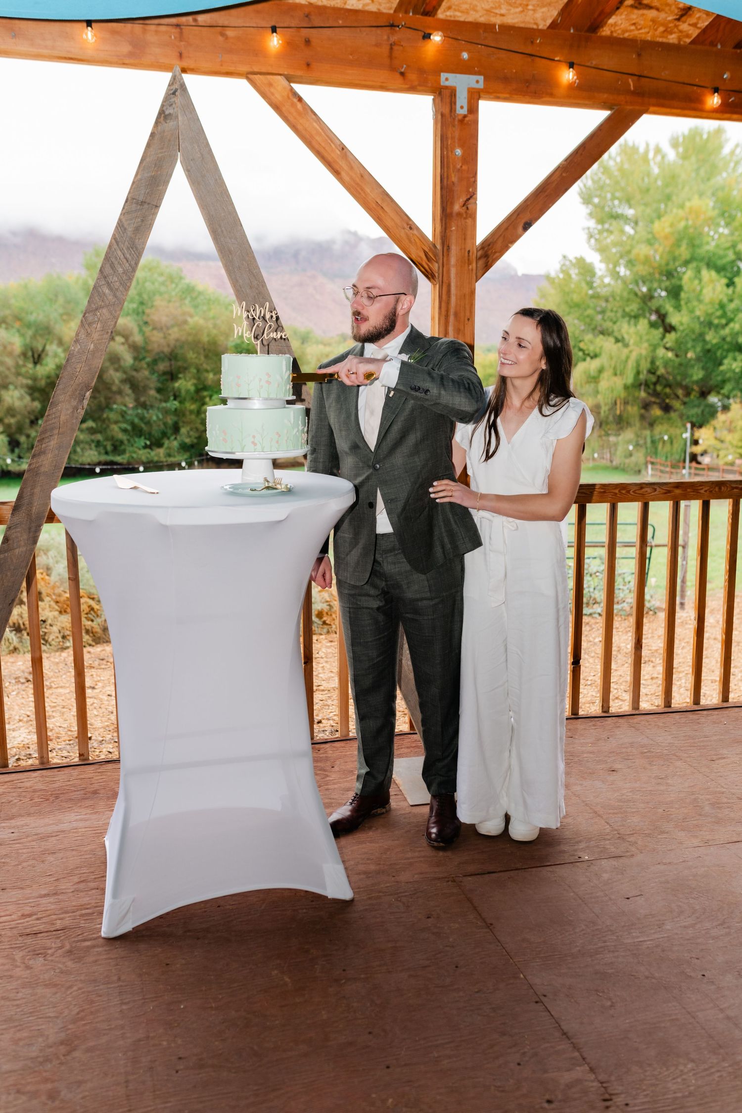 Wedding guests participate in an entertaining chair game during reception festivities.
