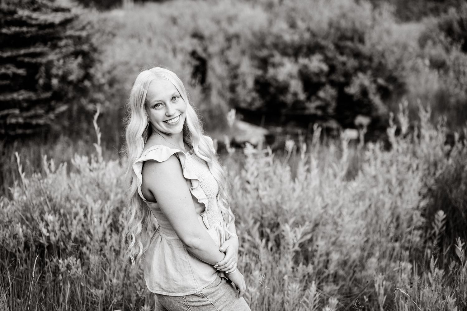 black and white over the shoulder senior portrait during her mountain senior session