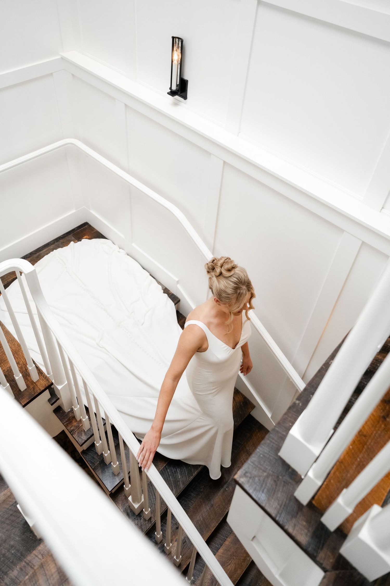 A sequence of photos showing someone descending a white staircase in a residential setting.