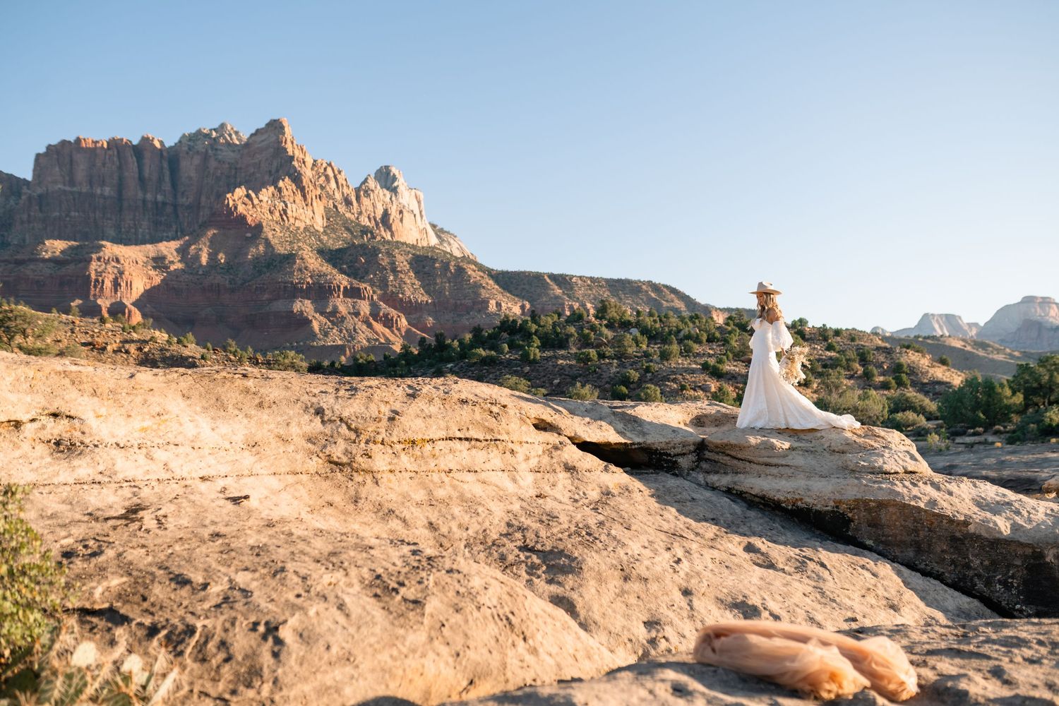 Utah elopement photographer captures the romance of a desert sunrise bridal session