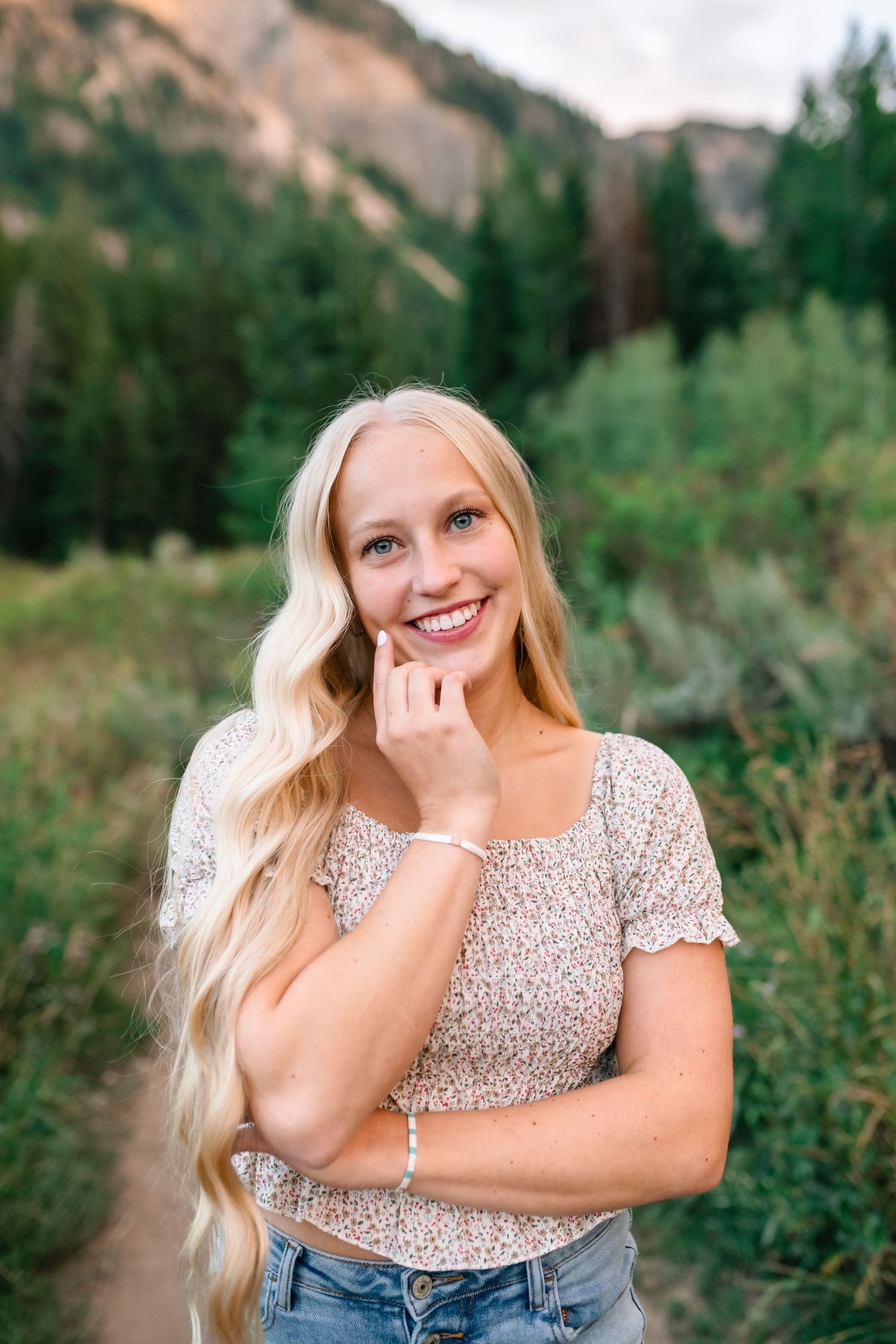 smiling senior portrait taken by Coley Cook, Utah senior photographer