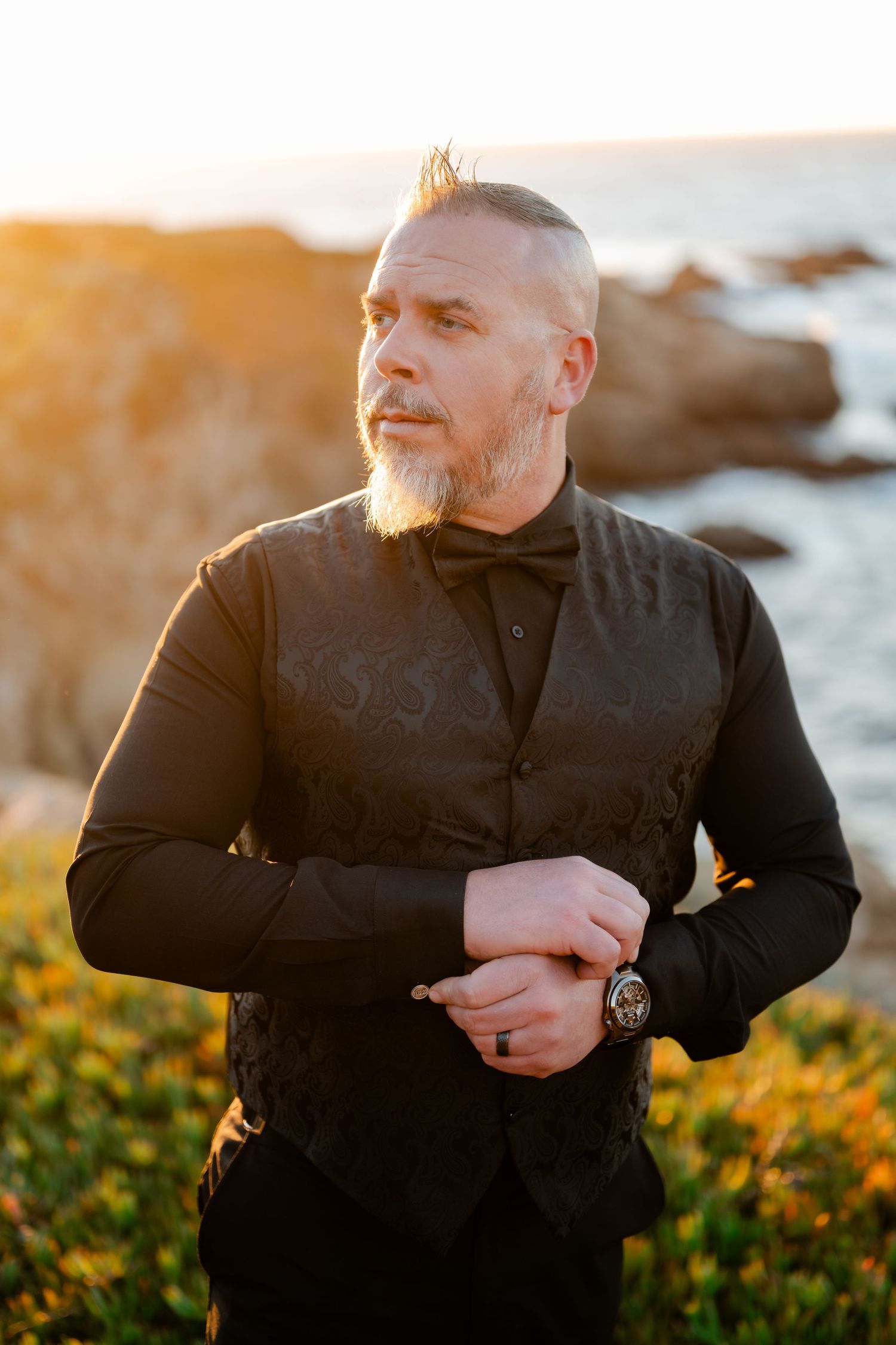 Close-up portrait series of a person in black clothing against a warm sunset background.