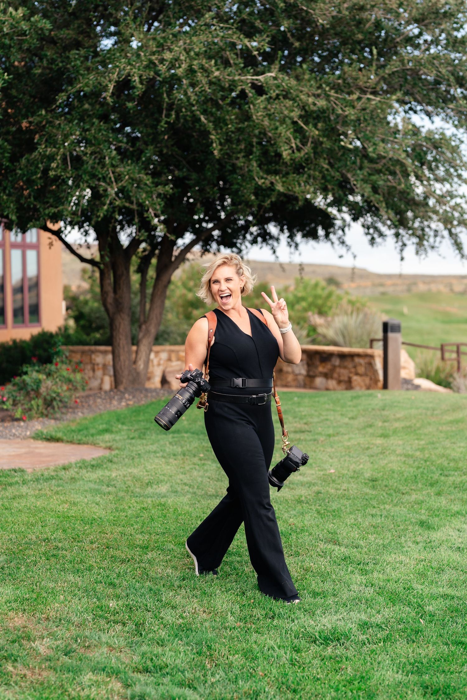 Utah Wedding Photographer smiling at The Ledges golf course in St. George