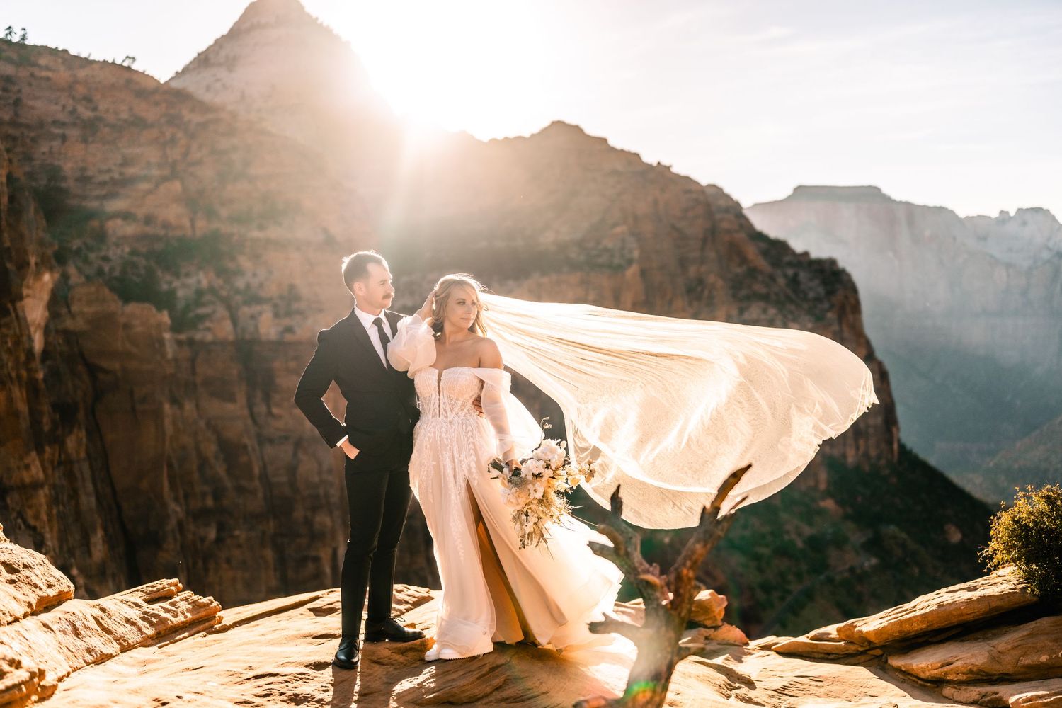 Wedding portraits at the Zion Overlook at sunset by Utah Elopement Photographer