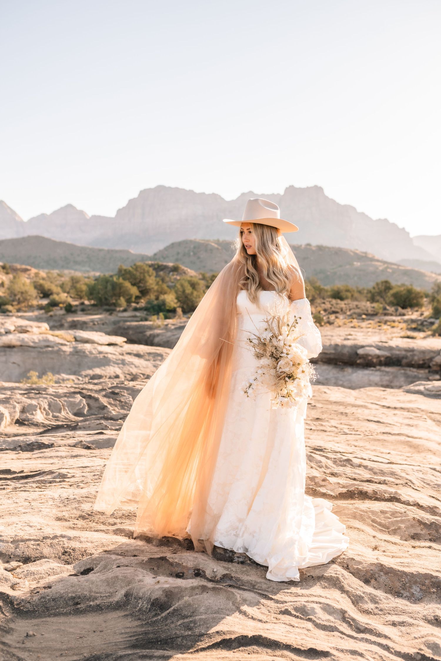 Utah elopement photographer captures the romance of a desert sunrise bridal session