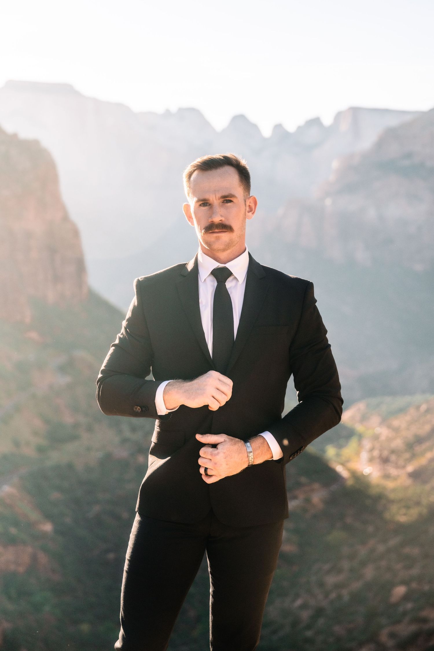 Groom detail portrait during Zions National Park Elopement by Utah elopement photographer and videographer