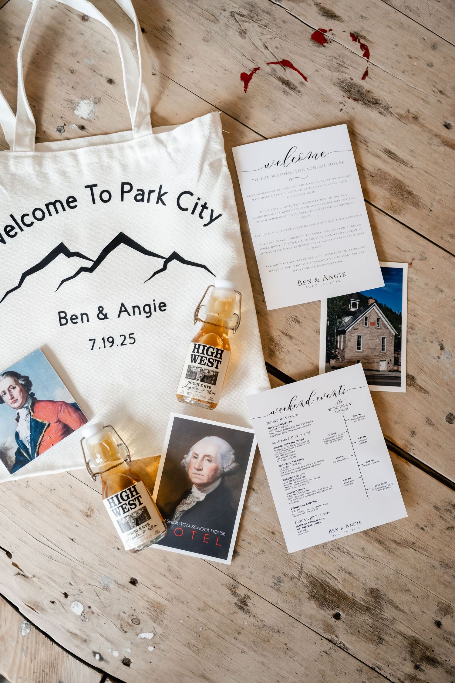 Wedding invitation materials and memorabilia laid out on a rustic wooden surface.