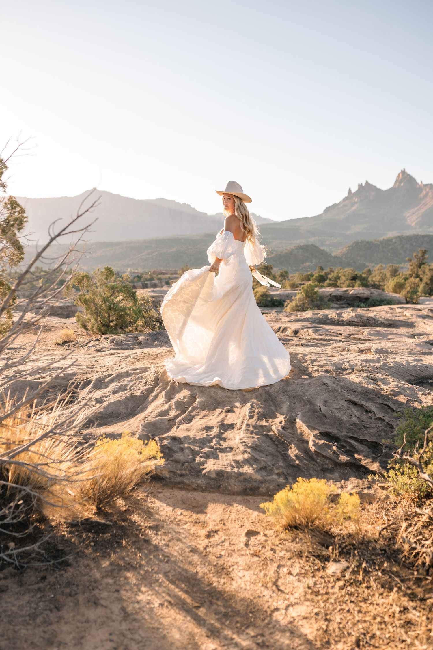 Utah elopement photographer captures the romance of a desert sunrise bridal session