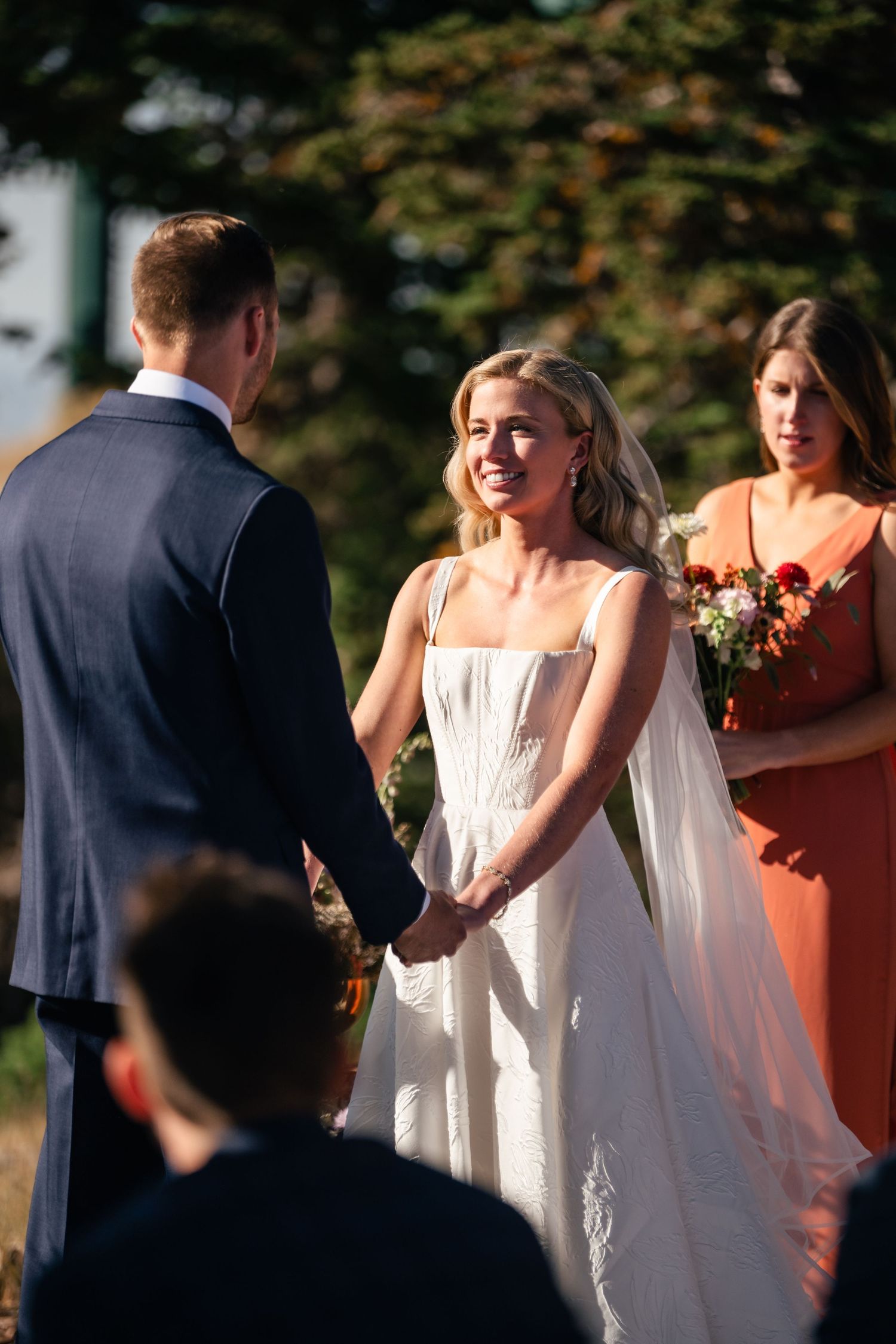 Wedding ceremony moments captured in a series of candid photos showing the bride and wedding party outdoors.