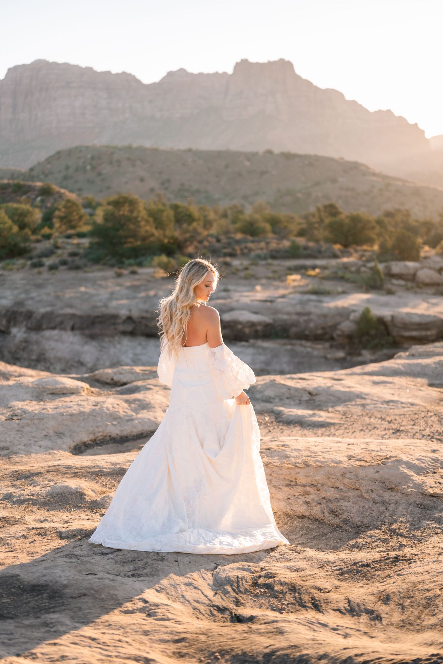 Utah elopement photographer captures the romance of a desert sunrise bridal session