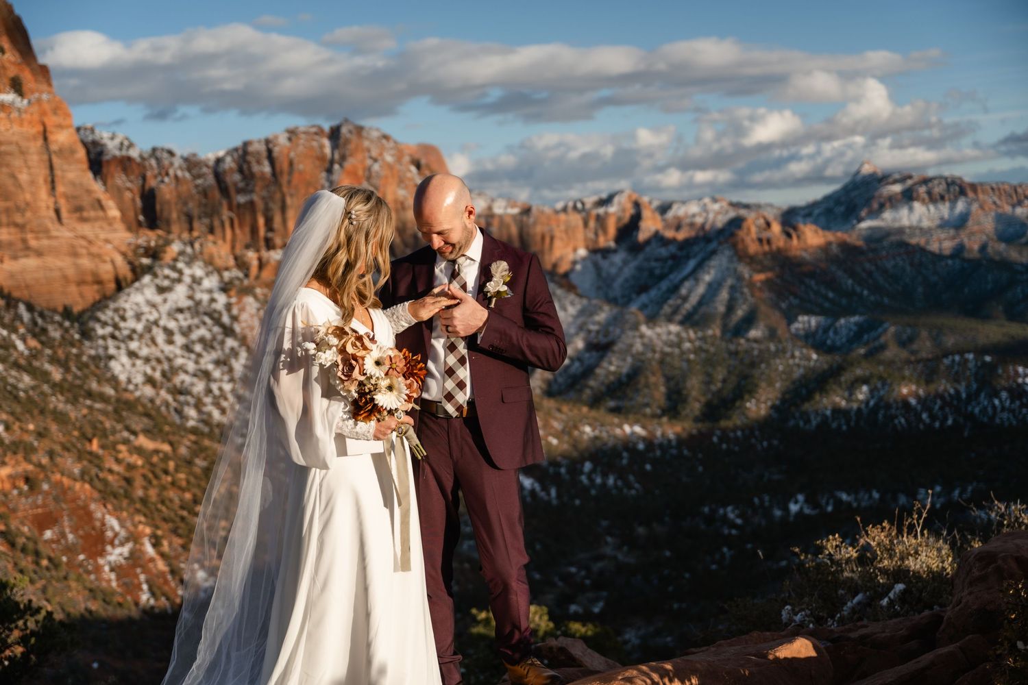 Panoramic view of red rock canyons during winter wedding photoshoot.