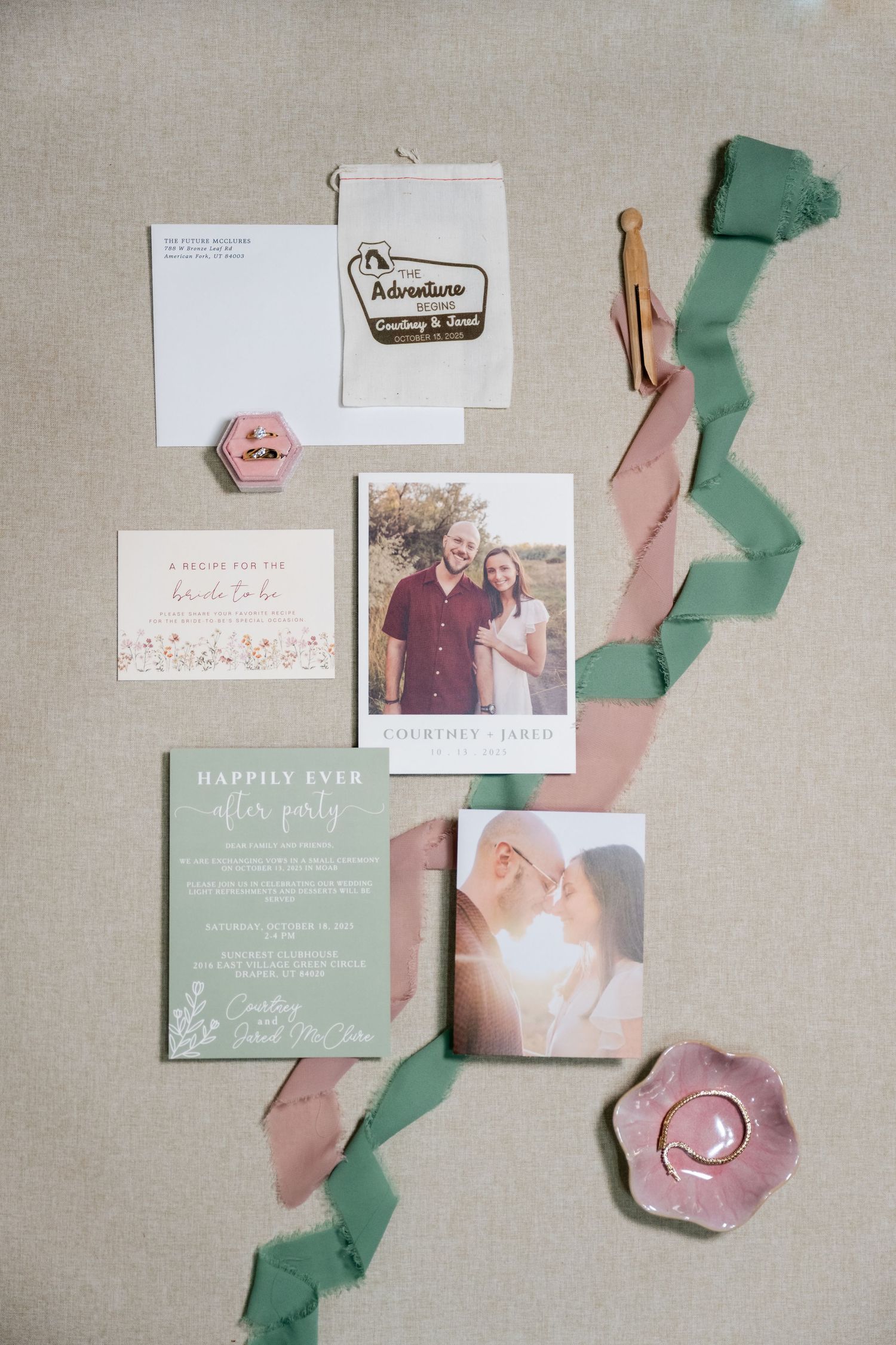 Wedding invitation suite featuring sage green and blush pink paper with torn edges and photographs.
