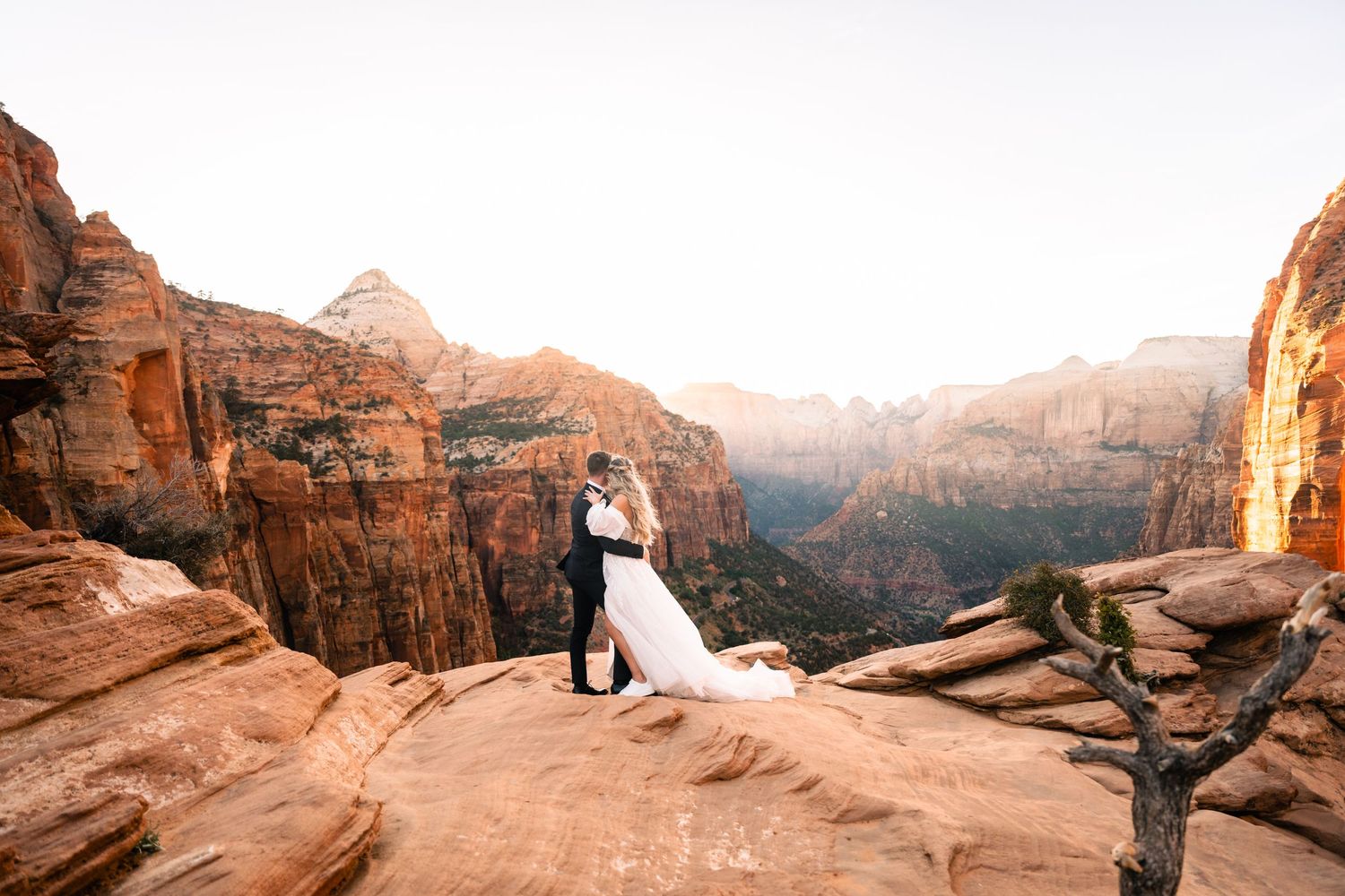 Wedding portraits at the Zion Overlook at sunset by Utah Elopement Photographer
