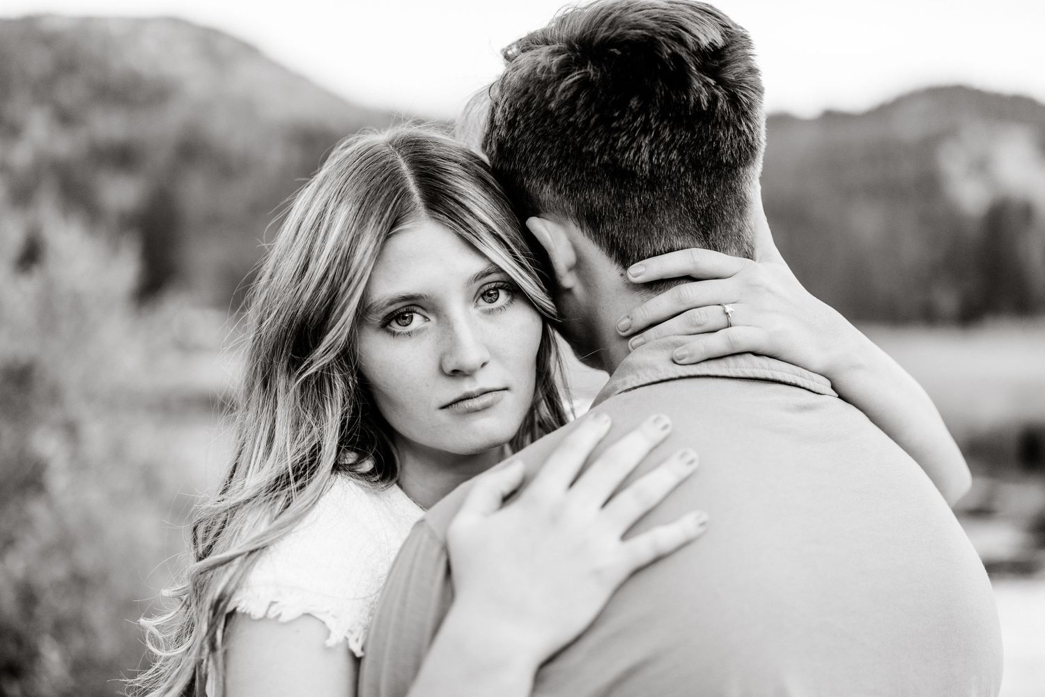 Black and white portrait series of a woman posing outdoors in natural lighting. Utah Mountain Engagements. Engagement Photographer.
