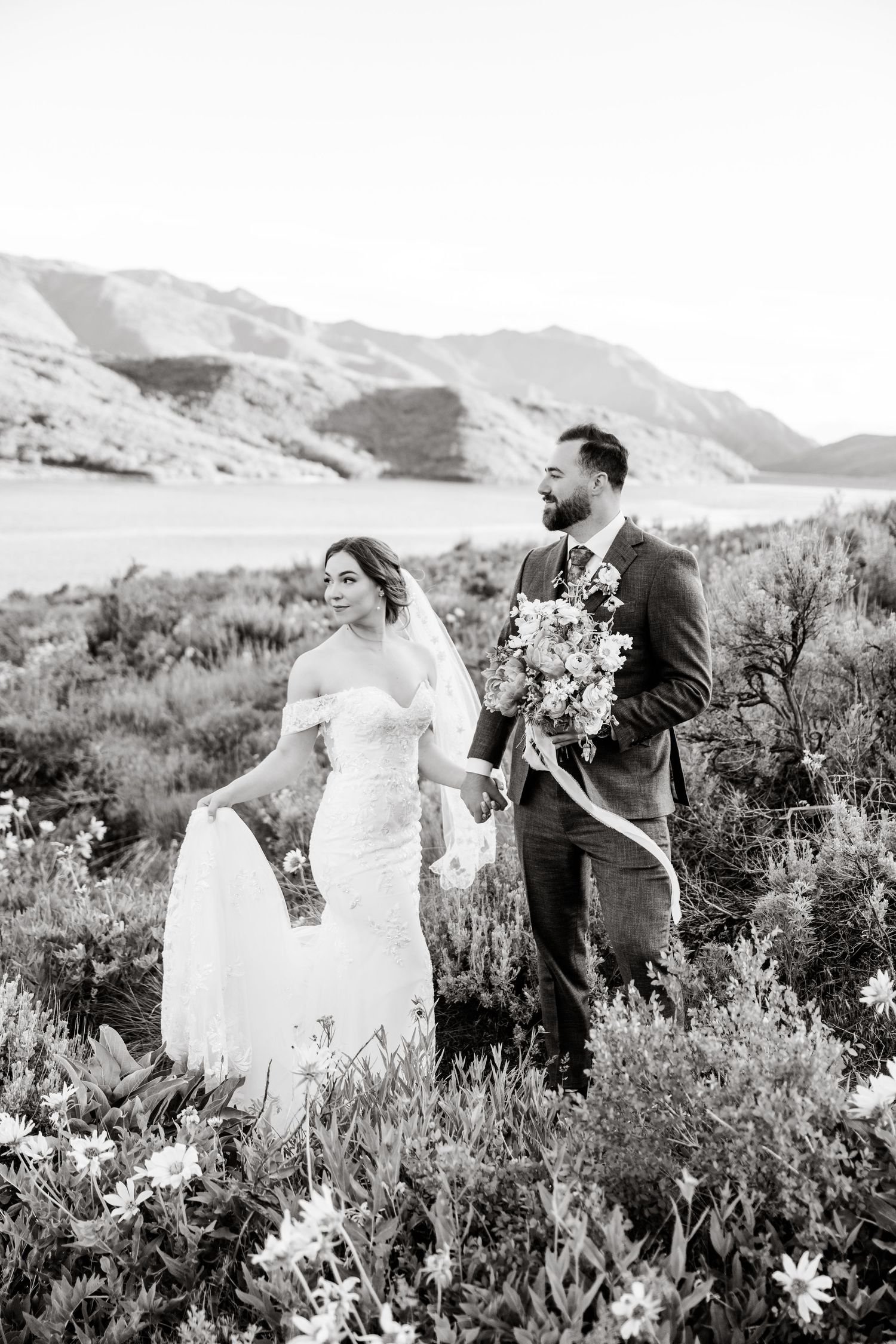 Black and white wedding photos captured in mountain wildflower field. Mountain Wedding Photographer.